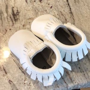 Freshly picked baby toddler white moccasins shoes